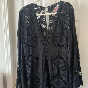 Free shipping .Never worn free people (no tags )black lace mini/ long top dress.